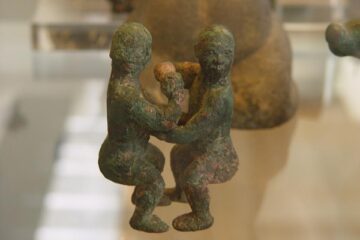 Eastern Zhou dynasty. Bronze figures of two wrestlers. 5thC BC-4thC BC (circa) Made in: China, Possibly from the South.